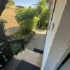 19 Haupteingang hinter dem Haus